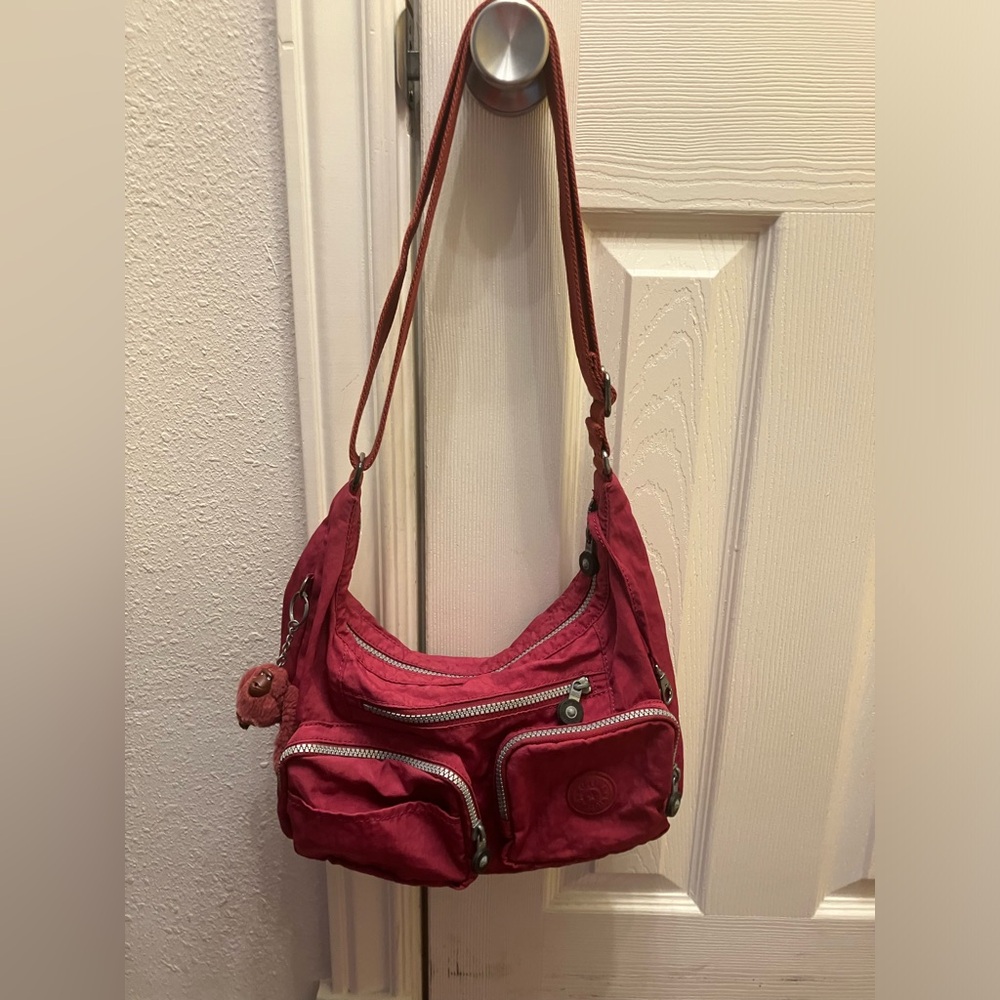 Kipling crossbody bag Berry pink (imperfect)